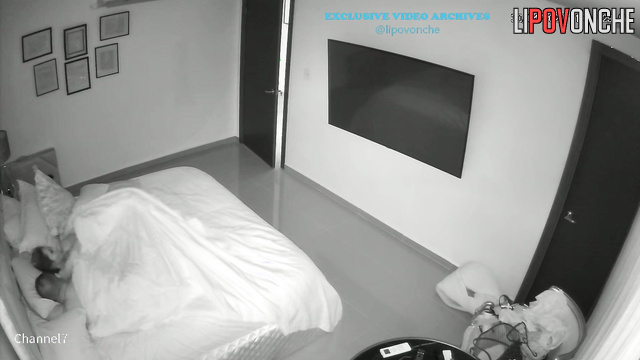 Someone installed a hidden cam in the cozy bedroom and watching them