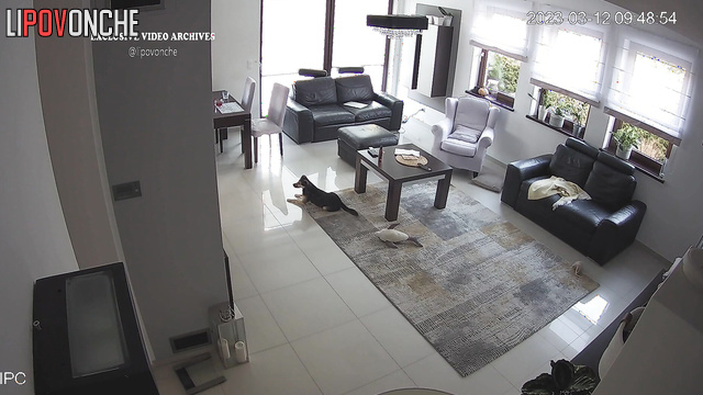 Lonely sexy blonde eating ih her huge empty living room