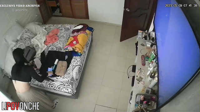Cool scene in the bedroom - she is dressing and being watched