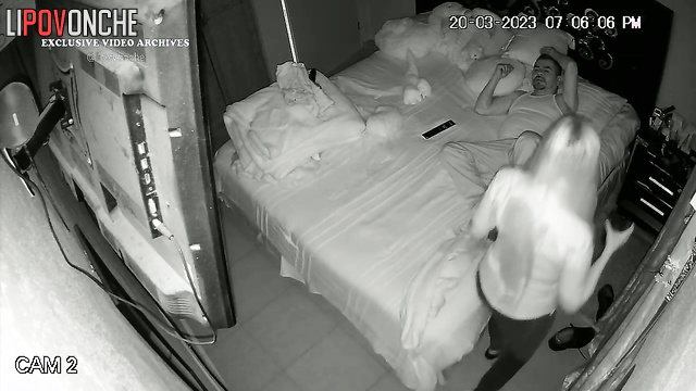 Guy tenderly hugging his wife during sleeping