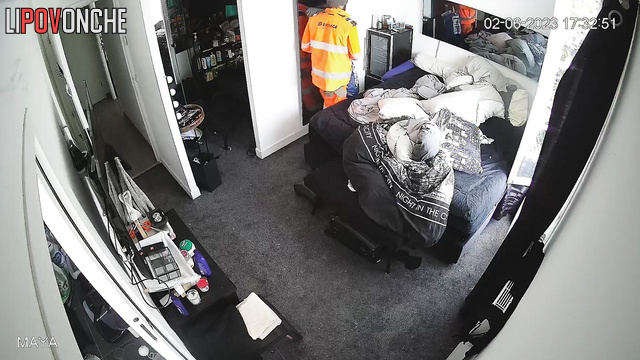 Brunette kissing her husband (he went from work)