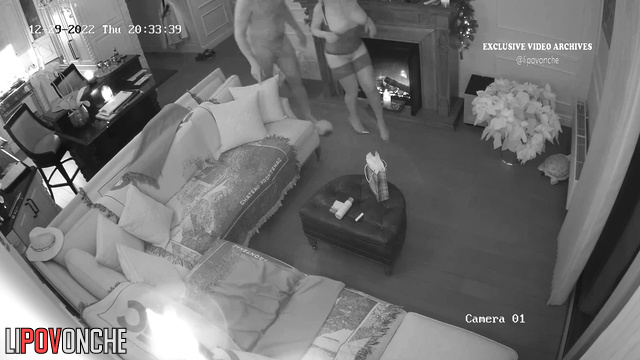 Couple having time on the floor (near the fireplace)