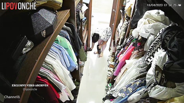 Babe trying different items in a huge dressing room