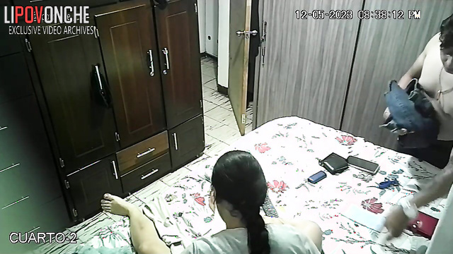 Couple kissing and dressing after wild sex (hidden tape)