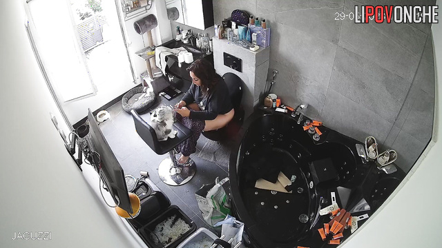 Brunette peeing and cutting his dog's hair (funny video)
