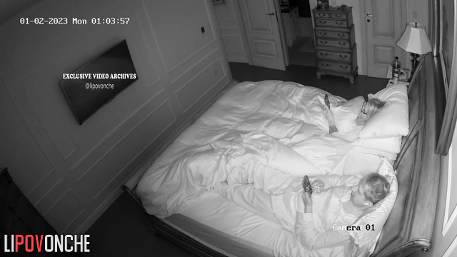 Couple chatting with friends in the bed (after work)