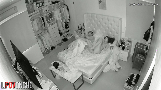 Skinny and sexy girl chatting with lover lying with husband