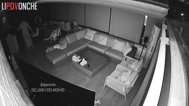 Topless babes and guy chatting in the living room