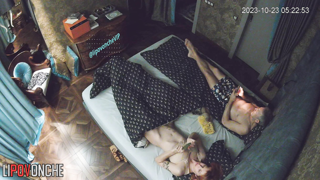 Couple playing phone games after gorgeous fuck in the bed