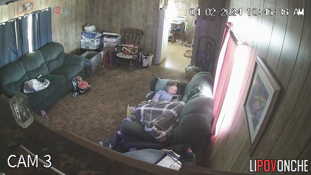 Blonde chatting with friend lying on the sofa, hidden video