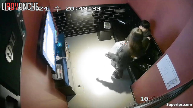 Asian couple having amazing petting in the karaoke club