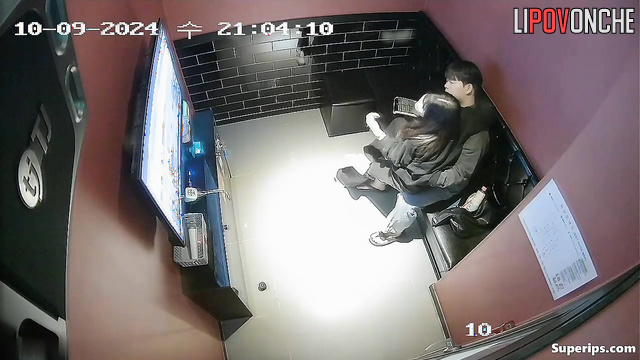 Asian couple having amazing petting in the karaoke club