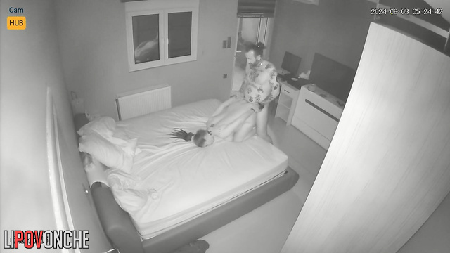 Naked tattooed couple making each other hot in the bedroom