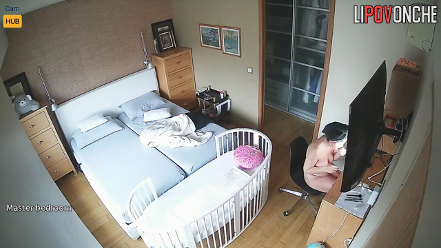 She sitting naked on a chair and trying to get ready for work