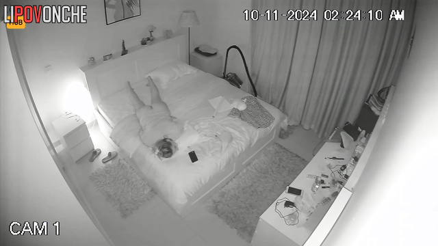Blonde without panties lying on the bed and masturbating