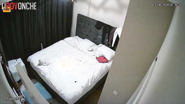 Slutty brunette masturbating with a sex toy on the bed