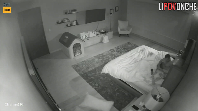 The wife is not distracted from looking at her phone as her husband fucks her.