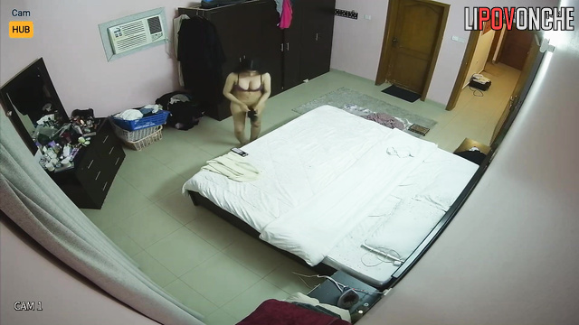 Live video from her bedroom - busty lady changing clothes