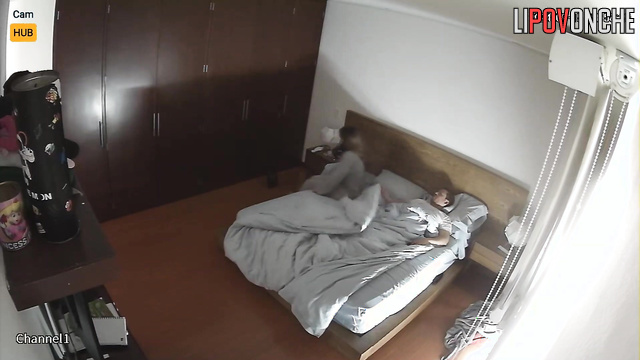 Bedroom love affair exposed by secret camera footage