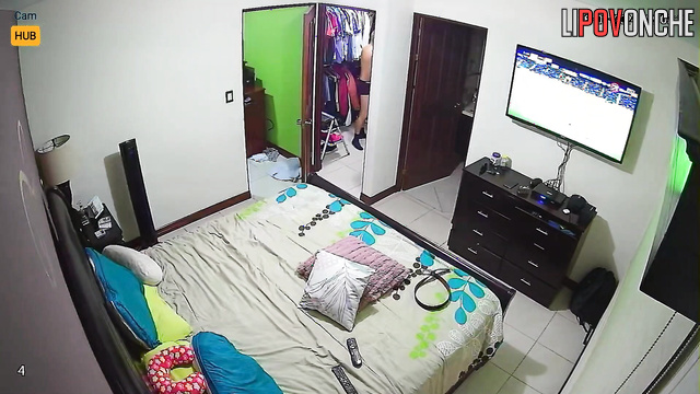 Bedroom romance captured on hidden cam footage