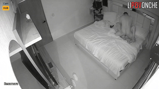 Guy gently kissing her neck before sex - bedroom scene