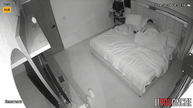Guy gently kissing her neck before sex - bedroom scene