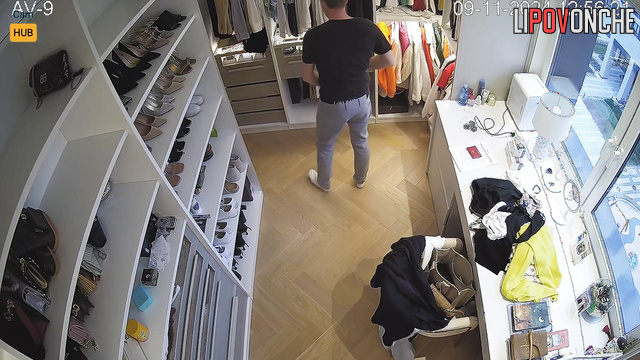 Couple preparing for birthday in a huge wardrobe