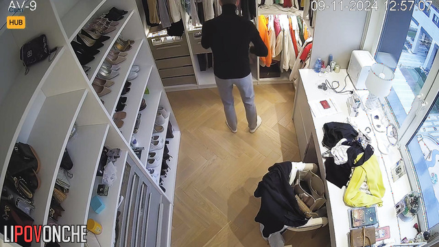 Couple preparing for birthday in a huge wardrobe