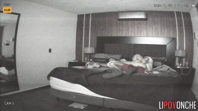She masturbating on the bed, her partner watching it