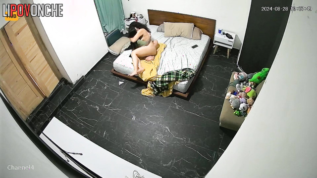 Young lesbians pleasure each other's clits in bed