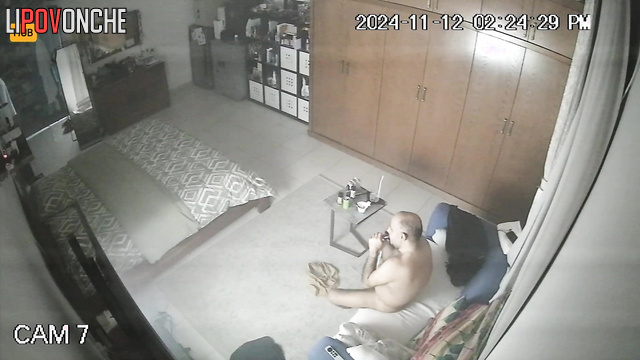 Naked bald guy enjoying love with his lover after smoking