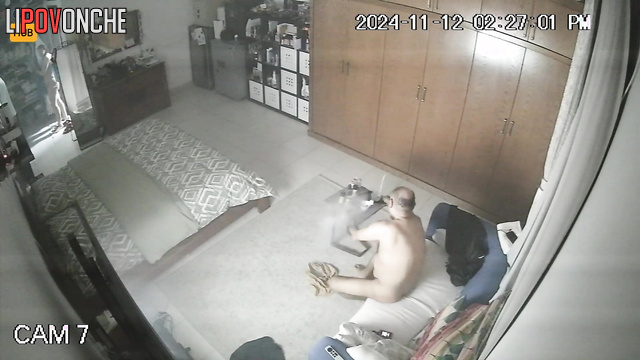 Naked bald guy enjoying love with his lover after smoking