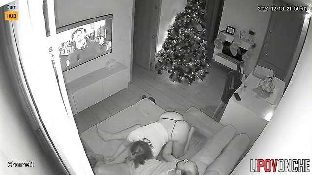 Sex on New Year's Eve - couple doing it near the Christmas tree