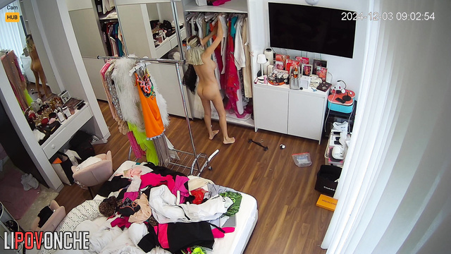 Busty blonde changing hot clothes in her huge room