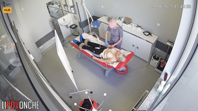 Boobs of this sexy blondie are about to get bigger (video from camera from clinic)