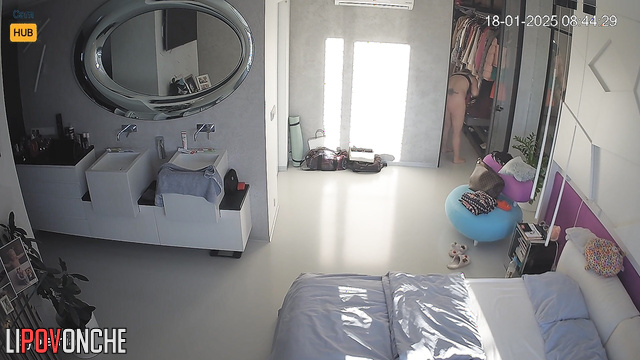 Lesbian couple dressing after woken up (live video)