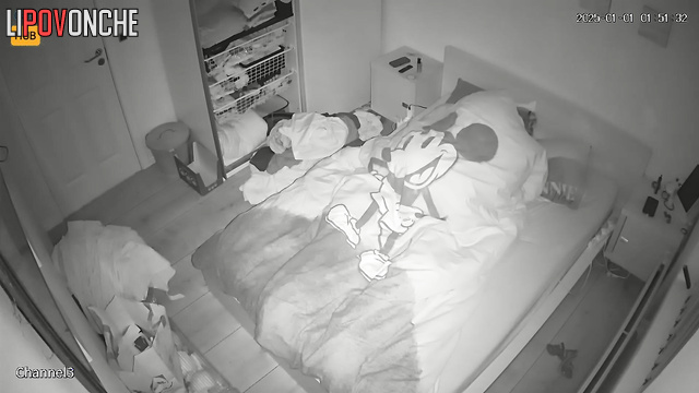 Couple fucking under a blanket with a Mickey Mouse pattern
