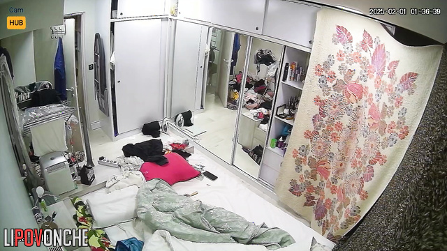 Bedroom hidden video - someone watching her naked