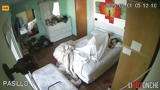 Argentine couple doing what they like best (bedroom)