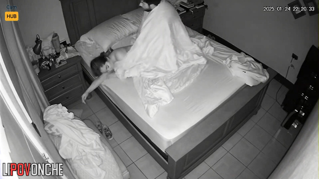 Boyfriend giving her pleasure under the blanket