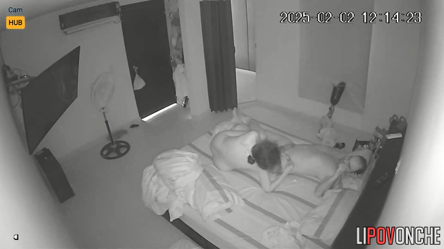 Young couple playing adult games in the cozy bedroom
