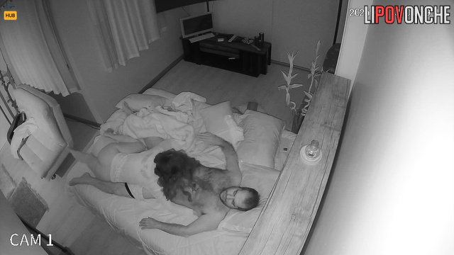 Couple hugging in the cozy bedroom / she wants to make him blowjob