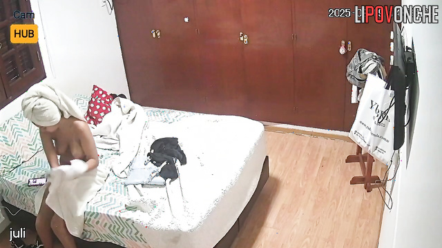 Sexy Argentinian woman relaxes naked after showering and getting dressed to go outside