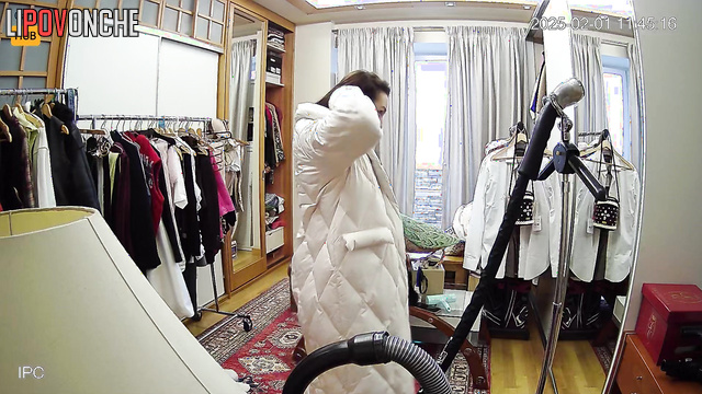 Hidden camera in the house of a seductive prostitute: the girl tries on new outfits.