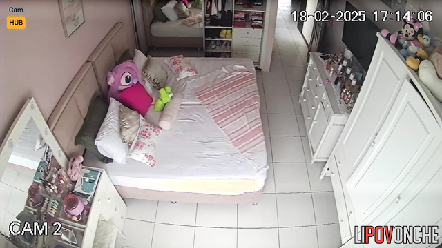 Hidden camera from sister's bedroom: Bolivian girl changes clothes after bath.