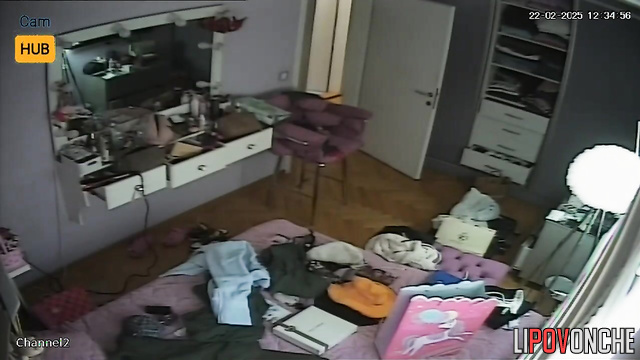A chubby Serbian blonde changes her clothes in her bedroom