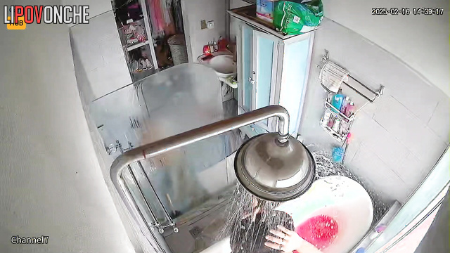 Chubby brunette still didn't realize she was being filmed in the bathroom