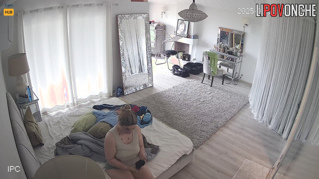 While no one is home, a sexy chubby blonde takes off her panties
