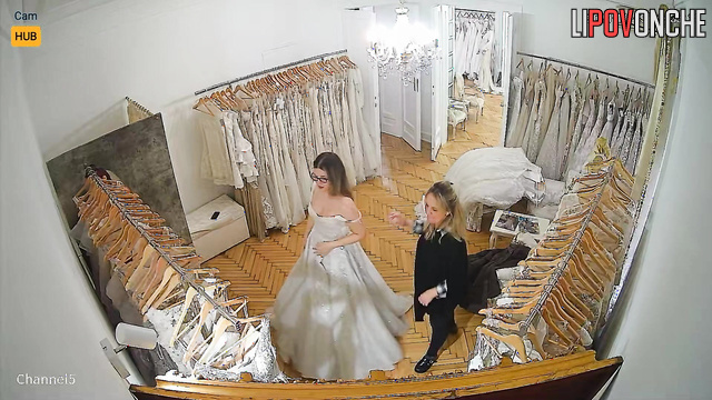 Bride picks dress for her wedding and you can see her boobs