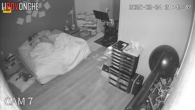 Married couple shows love to each other under the blanket